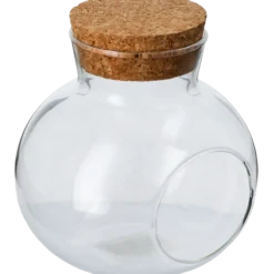 Glaskula med kork och hål